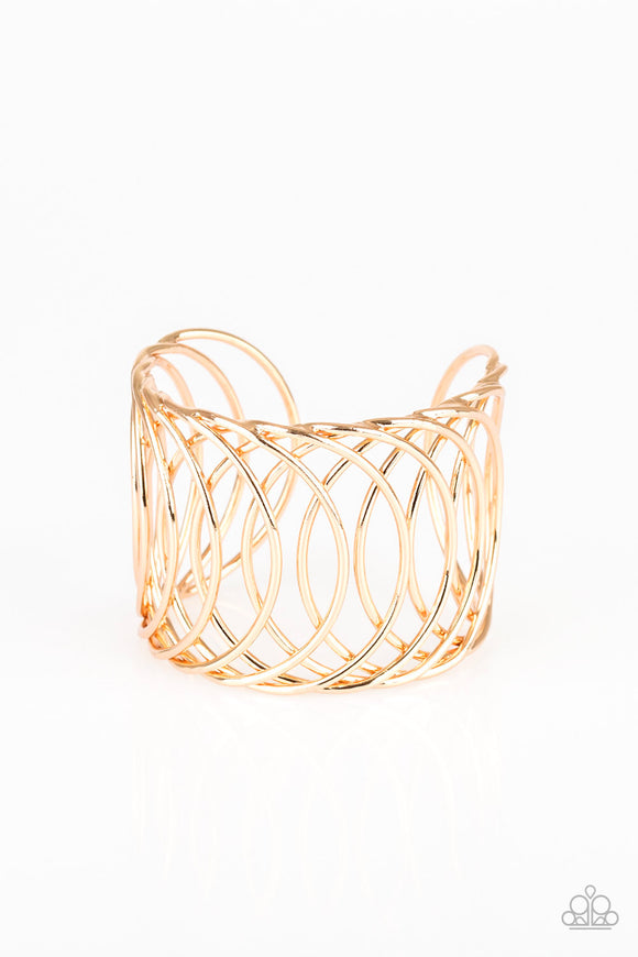 Dizzyingly Diva - Gold Cuff Bracelet